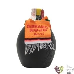 Gusano Rojo „ Olla Santiada ” original 100% of agave Mexican Mezcal 38% vol.  0.94 l